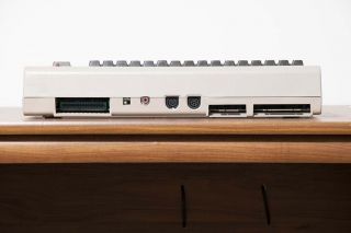 Commodore 64 vintage computer with video composite cable. , 2