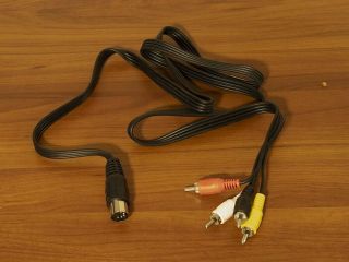 Commodore 64 vintage computer with video composite cable. , 8