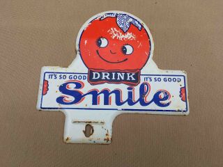 Vintage Drink Smile Orange Soda Metal Advertising License Plate Topper Sign