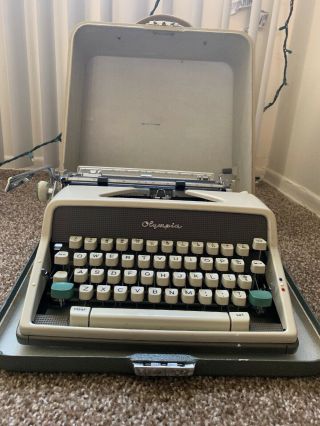 Vintage Olympia Deluxe Portable Typewriter W/case Need Tlc
