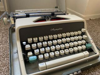 Vintage Olympia DeLuxe Portable Typewriter W/Case Need TLC 2