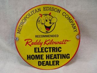 Vintage Reddy Kilowatt Metropolitan Edison Electric Co.  Porcelain 7 " Sign