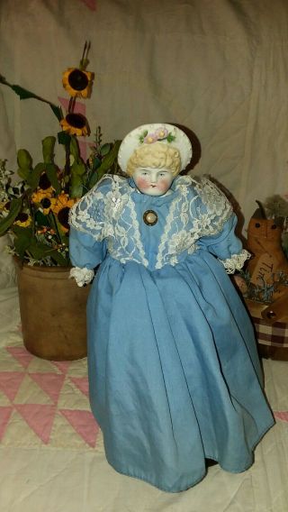 Antique 14 1/2 Inch Bonnet Head Doll in Vintage Blue. 3