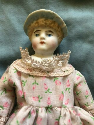 1890 ' s Bonnet Head Doll Blue Hat with Pink Bow and Molded Blouse with Gold 2