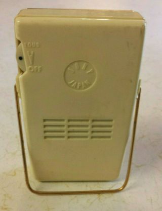 VINTAGE SONY TR - 610 TRANSISTOR RADIO.  IVORY W/GOLD STAND IN ORDER 4