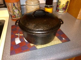 Vintage Unmarked 4 Quart 10 1/4 Inch Hammered Cast Iron Dutch Oven With Lid.