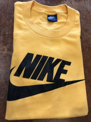 Vintage 1980’s Nike T - Shirt Yellow With Black Print Men’s Size Large