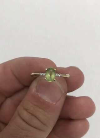 A Fine Peridot And Diamond Solid 9ct Gold Ring