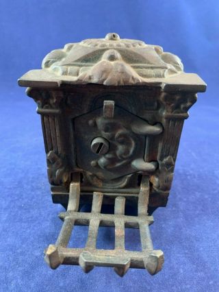 Antique Vintage Cast Iron (CI) Still Bank - Cast Iron Bank with Bars Across Door 3