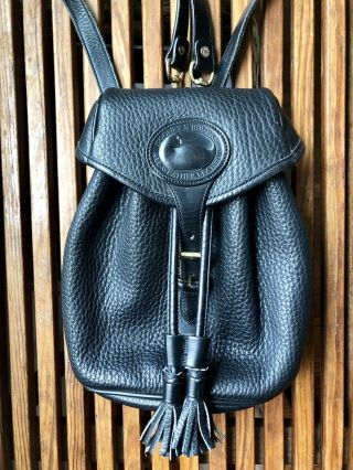 Vintage Dooney & Bourke Black Pebbled All Weather Leather Flap Backpack