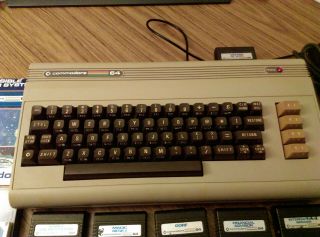 Vintage Commodore 64 - and - includes games and power pack 3