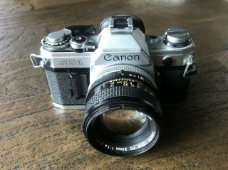 Vintage Canon AE - 1 35mm SLR Film Camera Kit with FD 50 mm Lens (Made in Japan) 2
