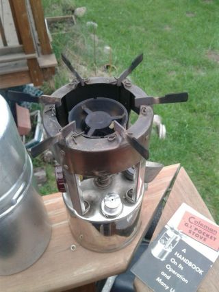 VINTAGE COLEMAN G.  I.  POCKET STOVE WITH CANISTER AND HANDBOOK 4