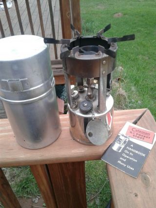 VINTAGE COLEMAN G.  I.  POCKET STOVE WITH CANISTER AND HANDBOOK 5