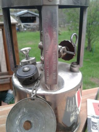VINTAGE COLEMAN G.  I.  POCKET STOVE WITH CANISTER AND HANDBOOK 7