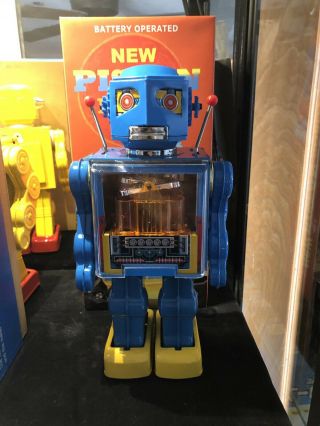 Rare Metal House Blue Piston Robot