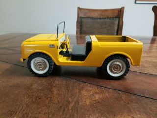 Vintage Tru Scale International Scout.  Yellow In Color