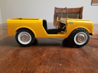 Vintage Tru Scale International Scout.  Yellow in color 5