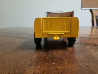 Vintage Tru Scale International Scout.  Yellow in color 6