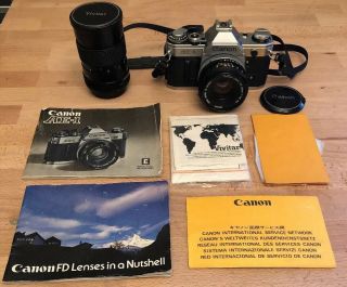 Vintage Canon Ae1 35mm Camera With 50mm 1:1.  8 Lens,  135mm 1:2.  8 Lens,  Manuals