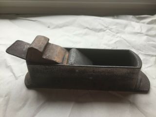 Vintage cast iron wood plane; blade marked Ohio Co Cast Iron Warranted 4