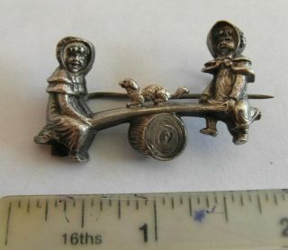 Sweet Antique Brooch Pin Of Children On A See Saw With A Dog