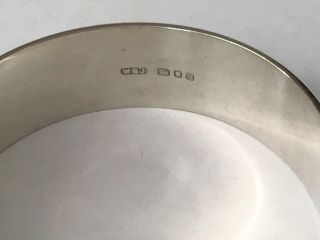 Vintage silver engraved bangle bracelet.  Width 3/4”.  Weight 27 grams 5