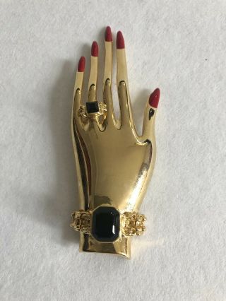 1980’s Butler & Wilson Gilt Hand With Red Nails And Black Jewel Detail