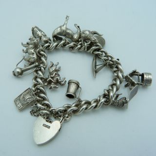 Vintage.  925 Sterling Silver Charm Heart Bracelet With 12 Charms - 67g