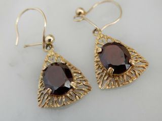A Stunning 9 Ct Gold Large Oval Garnet Drop Earrings