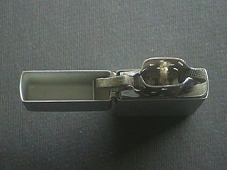 vintage stainless steel zippo lighter,  circa 1950 - 57 4