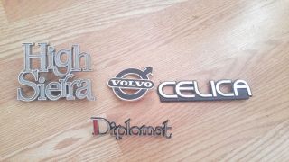4 Vintage Fender Emblems,  High Sierra,  Celica,  Volvo,  And Dodge Diplomat