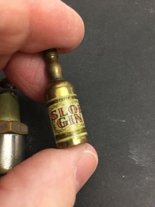 2 Miniature Vintage Pocket Striker Lighters Sloe Gin Bottle & Germany Spark Plug 2