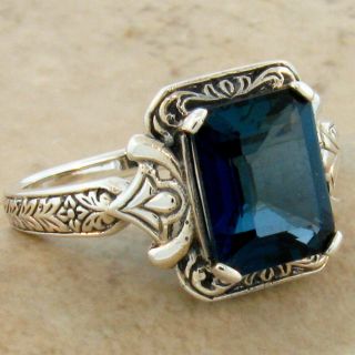 4 Ct.  London Blue Topaz Antique Design.  925 Silver Ring Size 5,  278