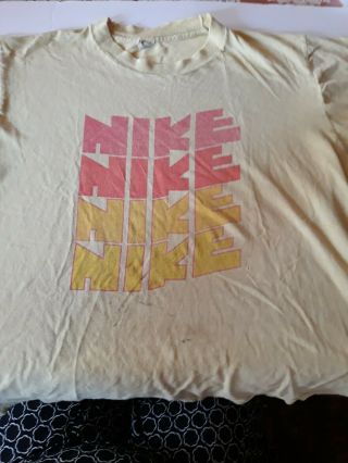 Vintage 70s Nike Sportswear Mens Medium Spell Out Print Shirt Yellow Red Usa