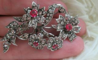 A Vintage Sterling Silver Floral Brooch Set With Diamond And Ruby Paste Stones