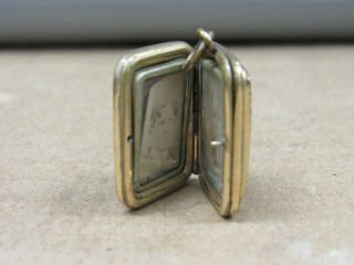 VINTAGE VICTORIAN GOLD FILLED DOUBLE PHOTO LOCKET WITH EARLY 1900 (13900 - RING - O) 2