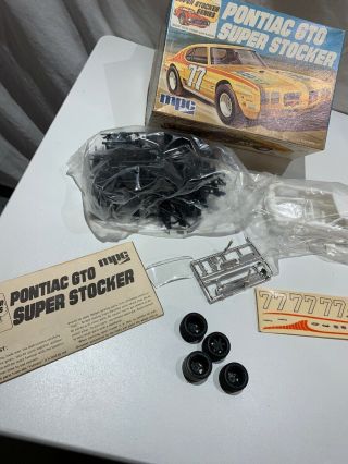 VERY RARE MPC PONTIAC GTO STOCKER NEVER ASSMEBLED.  COLLECTOR KIT. 8