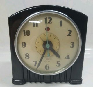 Vintage General Electric Alarm Clock Model 7h154 Tested/working Bakelite Swirl.