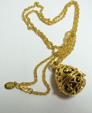 Joan Rivers Opening Egg Necklace