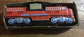 Vintage Tin Battery Operated Diesel Locomotive Orange W/ Lighted Moving Pistons