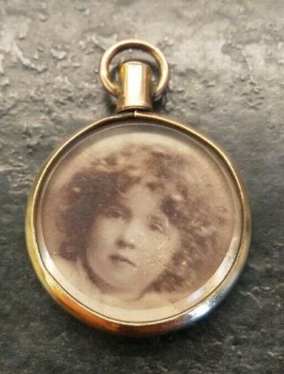 Antique Small Rolled Gold Glass Picture Locket,  7/8 " In Diameter.