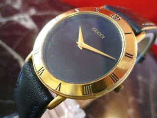 Good Gucci 3000.  2.  M Mens Black Gold Quartz Vintage Swiss Made Watch Nr