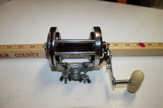 Vintage Penn No.  140 Squidder Saltwater Fishing Reel W/ Rod Clamp Made In Usa