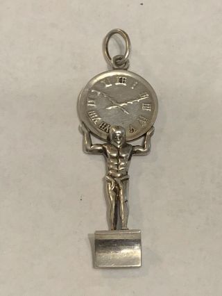 Rare Vintage Tiffany & Co.  Sterling Silver String Man Carrying Clock Pendant