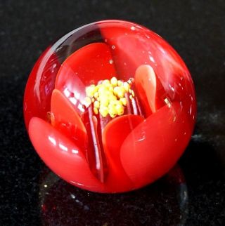 A Vintage Art Glass Paperweight With Red And Yellow Flower