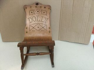 Antique “dolly” Lincoln Rocking Chair