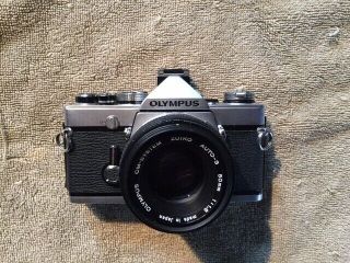 This Item Is A Vintage Olympus Om - 1n Film Camera With 50mm 1.  8 Lens.