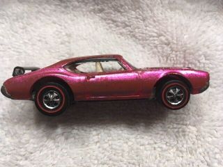 Hot Wheel Redline Olds 442 in hot pink near 2