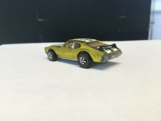 Redline Hotwheels Olds 442,  Yellow. ,  soft wing,  Not sure on stripes. 11
